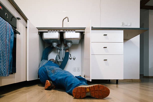 Professional Drain Cleaning technician working in Titusville, FL